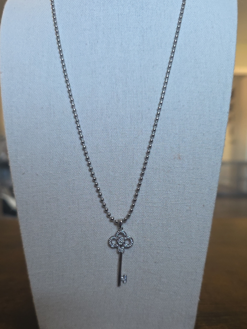 Silver Key Pendant Necklace with Crystal Accents